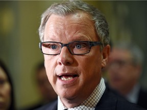 Premier Brad Wall speaks to the media during a scrum at the Saskatchewan Legislative Building on Feb. 8.