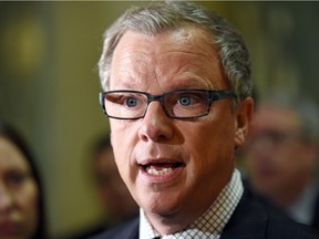 Premier Brad Wall speaks to the media at the Saskatchewan Legislative Building on Feb. 8, regarding federal funding to clean-up of oil wells no longer capable of production.