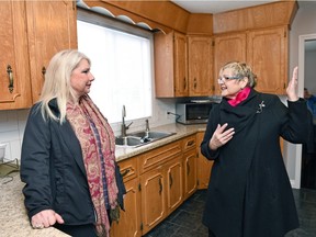 Trudy Shingoose (L) executive director, 4 Directions Child & Family  Services and Regina Qu'Appelle MLA Laura Ross at the opening of Martha Cachene's Home for Youth.