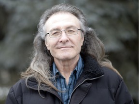 Howard Lachambre stands in front of his Regina home.