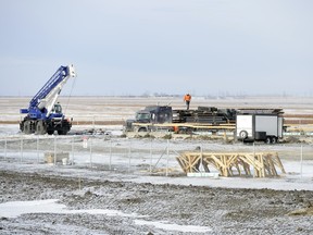 Construction crews work on the Bird/Wright joint venture public school on Mapleford Ave. in Regina on Tuesday.