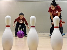 St. Jerome Elementary School student Tyson Litzenberger, 8, tries his hand at bowling as part of a Learning Everyday & Actively Participating (LEAP) program activity at the University of Regina.  The program is a contender for a $25,000 grant that could provide them with specialized gym equipment at their school.