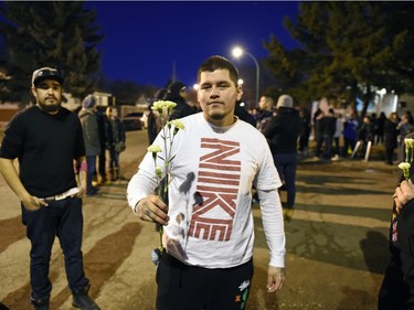 Joshua Steeves during a vigil being held to draw attention to violence in North Central and elsewhere in Regina.  Core area community members listened to elders speak and sing honour songs and took part in a sweet grass ceremony and made a public call to end violence.