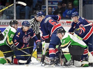 A pileup up at the Regina Pats net during a WHL game against the Prince Albert Raiders during WHL hockey action at the Brandt Centre in Regina on February 26, 2016.