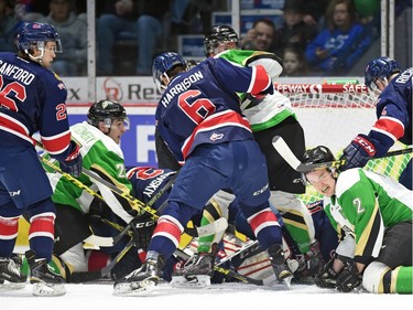 A pileup up at the Regina Pats net during a WHL game against the Prince Albert Raiders during WHL hockey action at the Brandt Centre in Regina on February 26, 2016.