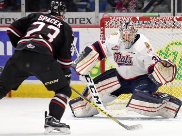 Michael Spacek of the Red Deer Rebels prepares to shoot on Regina Pats goalie Tyler Brown during WHL action at the Brandt Centre on Monday.
