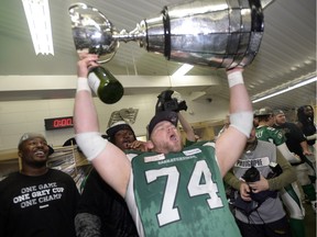 Mike Abou-Mechrek would love to see defensive tackle Keith Shologan, shown celebrating the Saskatchewan Roughriders' 2013 Grey Cup victory, return to the team after a two-year stint with the Ottawa Redblacks.