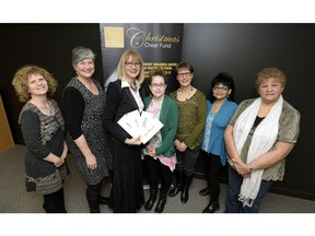 Final payments from the Regina Leader-Post Christmas Cheer Fund 2015 campaign were made this week to representatives from the four Regina women's shelters supported by the fund. Shown here are (left to right) Sarah Valli of SOFIA House, Maria Hendrika of Regina Transition House, Irene Seiberling of the Regina Leader-Post, Janet Tzupa and Carol Yoner of the YWCA Regina Isabel Johnson Shelter, and Brenda Sunshine and Margaret Crowe of WISH Safe House. BRYAN SCHLOSSER