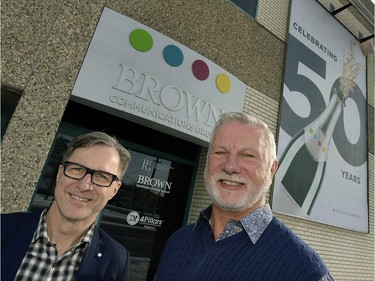 Ken Christoffel (L) president and CEO of Brown Communications and Jim Aho, executive vice president in front of the Brown Communications on Albert Street in Regina.  Brown Communications is turning 50.
