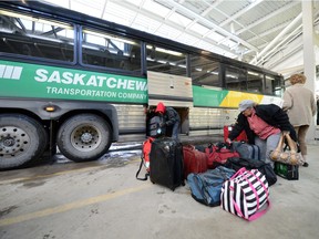 An STC bus from Saskatoon unloads at the Regina bus depot.
