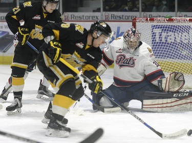 The puck gets away from Brandon Wheat Kings defence Ivan Provorov (9) while Regina Pats goalie Tyler Brown covers the net during a game held at the Brandt Centre in Regina on Saturday Feb. 13, 2016.
