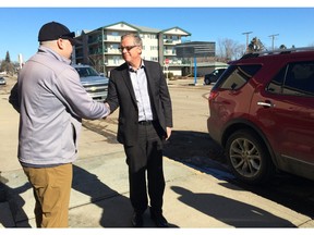Premier Brad Wall shakes hands with Dan Cugnet of Valleyview Petroleums Ltd. on Tuesday, February 23 in Weyburn. Wall was in Weyburn to meet with Mayor Debra Button and discuss oil issues in the southeast portion of the province. (RACHEL PSUTKA/Leader-Post)