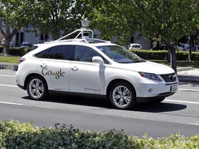 This May 13, 2014, file photo shows a Google self-driving Lexus at a Google event outside the Computer History Museum in Mountain View, Calif.