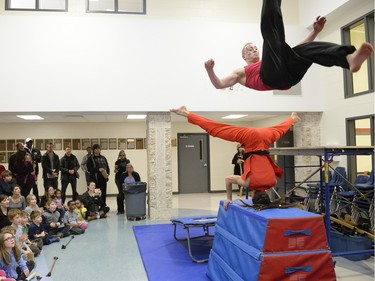 Cirque Nova performer Lancelo Cote Poirier flies through the air at Winter Carnival held at Carrefour Horizons school in Regina on Saturday March 12, 2016. The normally cold-weather event took place largely indoors.