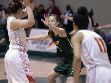 Cougars forward Christina McCusker defends her team's basket during the second game of a Canada West quarterfinal against the Calgary Dinos in Regina on Saturday March 5, 2016