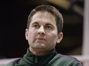 Interim director of athletics Curtis Atkinson watches the second game of a Canada West quarterfinal against the Calgary Dinos in Regina on Saturday March 5, 2016.