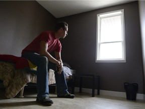 Mike Gerrand, director of operations of Street Culture Project Inc., sits on a bed in a room for at-risk youth in Regina on Tuesday March 15, 2016.
