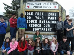 The Grade 8 class at Sacred Heart School in Estevan stand by the idle-free sign at their school. The students are finalists in the Samsung Solver of Tomorrow Contest.