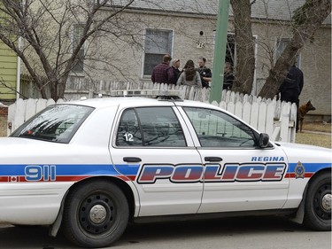 The Regina Police at a home on the 900 block Argyle Street in Regina on Tuesday.