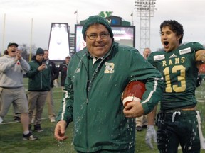 Frank McCrystal, shown here receiving a Gatorade shower after his last home game as the head coach of the University of Regina Rams in November of 2014, is being honoured by the PFC's Regina Thunder on Saturday.