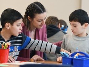 Syrian refugee students with teacher Jocelyn Gerspacher in a Grade 3/4 class at Marion McVeety School.