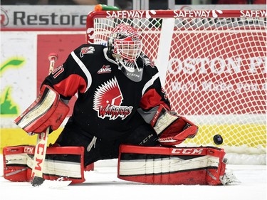 Moose Jaw Warriors goalie Zach Sawchenko blocks a shot during WHL hockey action against the Regina Pats at the Brandt Centre in Regina on March 11, 2016.