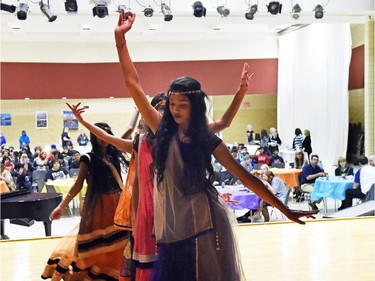 Deepa Rathour (C), a grade 10 student at F.W. Johnson Collegiate along with school mates participating in the Indian Dance during Diversity Day celebrating the International Day for the Elimination of Racism on March 21, 2016.