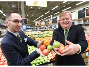 Save-On-Foods Regina store manager Christopher Drobot (L) and president Darrell Jones (R) at the new Saskatchewan store in Regina on March 31, 2016. The store officially opens its doors to the public on Friday, April 1st and will hold grand opening promotions and events starting April 2.