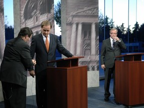 Saskatchewan Party leader Brad Wall (right) Prior to the 2011 leaders' debate at CBC studios in Regina, when he faced off against then-NDP leader Dwain Lingenfelter. Tonight his opponent is Cam Broten.