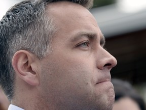 A grim NDP leader Cam Broten fields questions about the NDP's dropping of four candidates along with its campaign manager over the weekend.