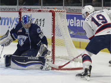 Pats' Jake Leschyshyn can't get the puck past Blades goal tender Brock Hamm during WHL action between the Regina Pats and Saskatoon Blades at the Brandt Centre in Regina Wednesday night.