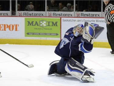 Pats' Sam Steel puts the puck just over the net of Blades goal tender Brock Hamm during WHL action between the Regina Pats and Saskatoon Blades at the Brandt Centre in Regina Wednesday night.