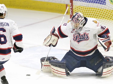 Hurricane's Carter Folk is stopped by Pats goaltender Tyler brown during game three of WHL playoff action between the Lethbridge Hurricanes and the Regina Pats at the Brandt Centre in Regina Tuesday night.