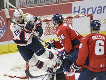 Regina Pats' Rykr Cole scores the eventual game winner on Lethbridge goal tender Stuart Skinner during game three of WHL playoff action between the Lethbridge Hurricanes and the Regina Pats at the Brandt Centre in Regina Tuesday night.