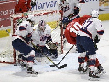 Hurricanes Cory Millette watches as Pats Goalie Tyler Brown kicks his shot wide during game four of WHL playoff action between the Lethbridge Hurricanes and the Regina Pats at the Brandt Centre in Regina Wednesday night.