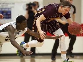 The LeBoldus Golden Suns' Brayden Kuski, forefront, shown in a 2015 Hoopla game in Saskatoon, had 25 points Thursday in Moose Jaw to help his team defeat the Saskatoon Bishop Mahoney Saints 82-46 in opening-day 5A boys action at the Saskatchewan High Schools Athletic Association basketball championships.