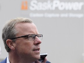 Premier Brad Wall speaks to media at the official opening of a carbon capture and storage facility at the Boundary Dam Power Station in Estevan, Sask. on Oct. 2, 2014.