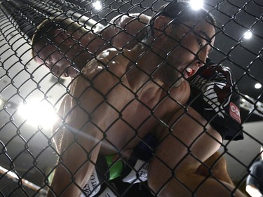 Sean Quinn, right, and Chris Day grapple during the Queen City Coronation, an MMA event held at the Orr Centre in Regina on Saturday March 12, 2016.