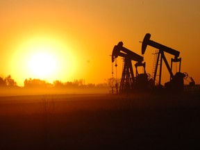 Pumpjacks toil south of Weyburn, where the oilpatch has been hit with layoffs.