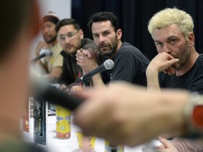 Actor Leo Fafard, right, listens to a fan question during a WolfCop 2 panel at Fan Expo Regina on Saturday, April 23.