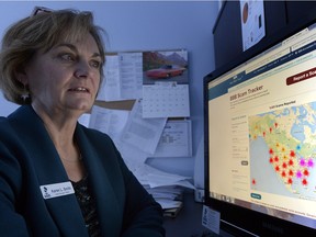 Better Business Bureau president Karen Smith demonstrates ScamTracker app to track scams from all over the world.