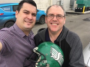 Global TV's Derek Meyers and the Regina Leader-Post's Rob Vanstone with a well-worn helmet that is autographed by several members of the Saskatchewan Roughriders' 1989 Grey Cup championship team. Meyers donated the helmet to the Raise-a-Reader sports memorabilia sale, which is to be held Sunday, beginning at 10 a.m., at the Conexus Arts Centre's Jacqui Shumiatcher Room.