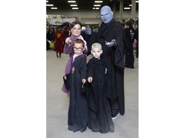Megan Parisien as Dolores Umbridge, Jan Armstrong as Lord Voldemort, Colten Crumley as Harry Potter and Preston Crumley as Draco Malfoy at Fan Expo Regina held at Canada Centre in Regina, Sask. on Saturday April. 23, 2016.