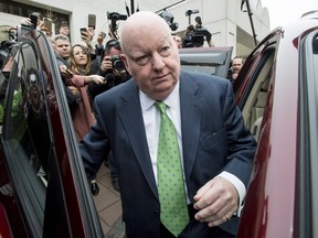 Senator Mike Duffy leaves the courthouse after being cleared of all 31 fraud, breach of trust and bribery charges he had been facing in relation to the long-running Senate expense scandal.