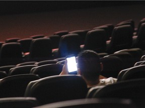 Cineplex says texting-friendly theatres aren't happening anytime soon.