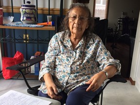 Elder Janet Severight, from the Cote First Nation, sits in the dining room of her daughter's home. She is concerned about the state of affairs on her reserve.