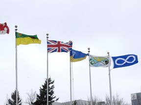The six flags in front of Regina city hall (left to right) Canada flag, Saskatchewan flag, Union Jack flag, City of Regina flag, Treaty 4 flag and the Metis Nation flag