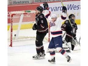 Riley Woods of the Regina Pats celebrates a goal against the Red Deer Rebels in WHL playoff action at the Brandt Centre on Tuesday night.