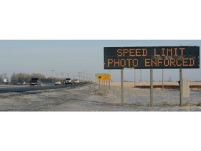 A photo speed enforcement sign warns drivers to ease up on Ring Road in south Regina.