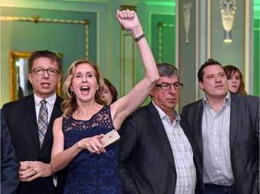 Saskatchewan Party supporters including former Sask Party finance minister Ken Krawetz (R) excited about the election results at the Hotel Saskatchewan in Regina on April 4, 2016.